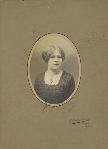 Portrait of a young woman with a necklace