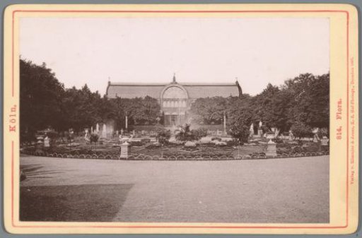 View of the botanical garden with a building in Cologne