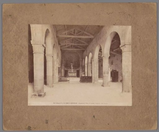 Interior of the Pieve di Santa Maria Assunta at San Gimignano, with a view of the choir