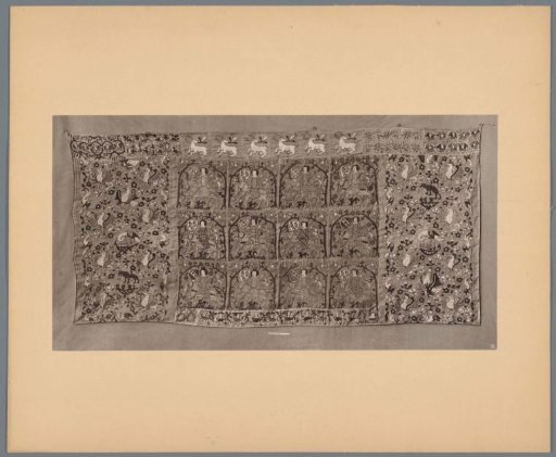 Carpet decorated with twelve knights with coats of arms and animals