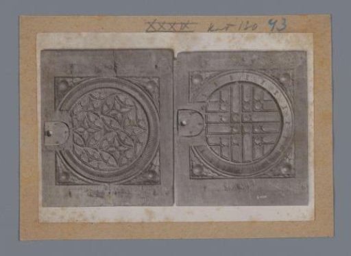 Two decorated wooden panels, possibly cabinet doors