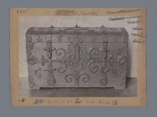 Chest decorated with volutes and organic motifs