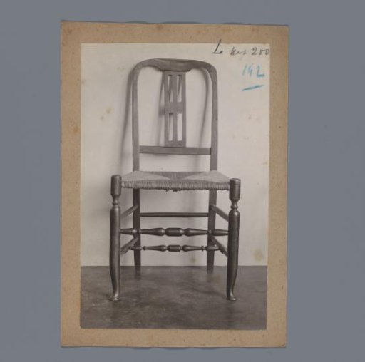 Chair with an openwork back and a rush seat