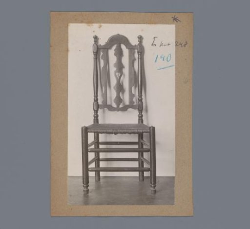 Chair with an openwork back and a rush seat