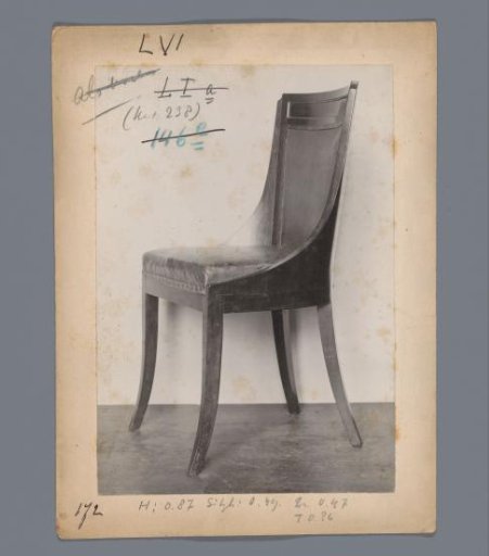 Chair with probable leather upholstery