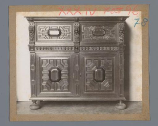 Zeeland cabinet decorated with lion consoles with copper rings and festoons