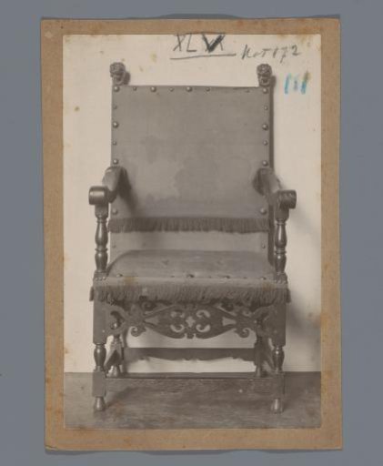 Armchair with back posts ending in lion masks with rings in the mouth in the Rijksmuseum, Amsterdam