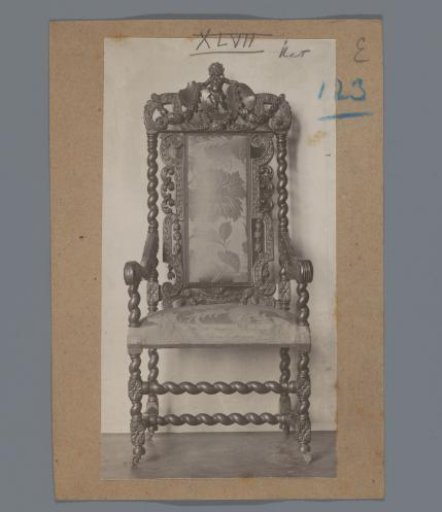 Armchair decorated with a child figure and garlands (probably) in the Rijksmuseum, Amsterdam