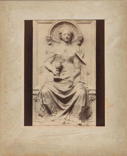 Relief of a woman holding a chalice and a cross