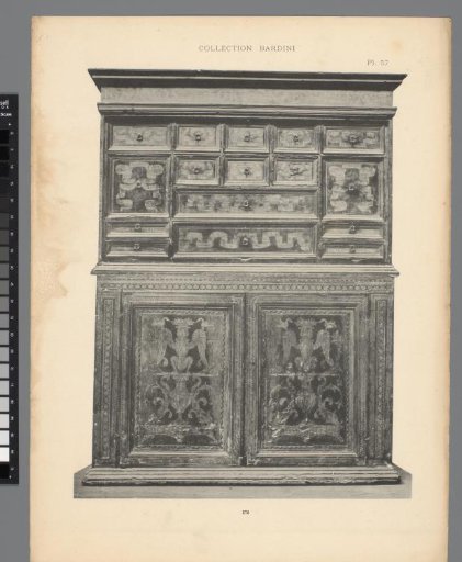 Decorated cabinet with small drawers and inscription