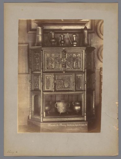 Cabinet with relief, images and pots