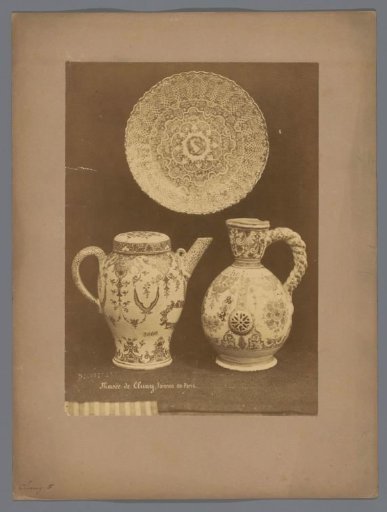Decorated earthenware, teapot, carafe and plate