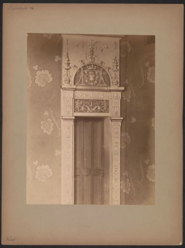Door with decorated frame