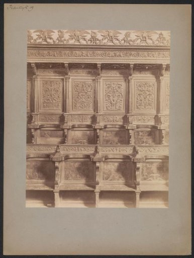 Row of wooden benches in a church