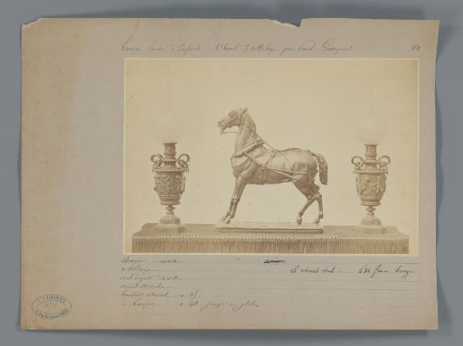 Bronze figures consisting of a horse and two lamps