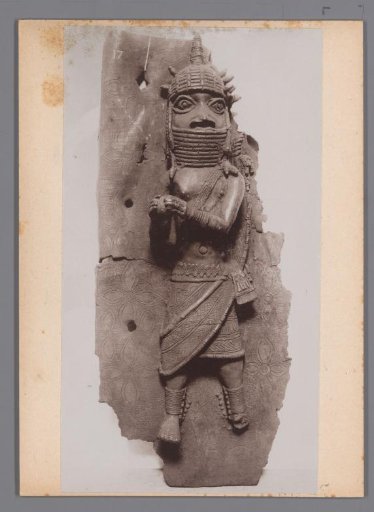 Bronze statue on a plaque from Benin