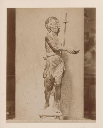 Sculpture of John the Baptist by Giambologna on a holy water stoup in the Cathedral of Pisa, Italy