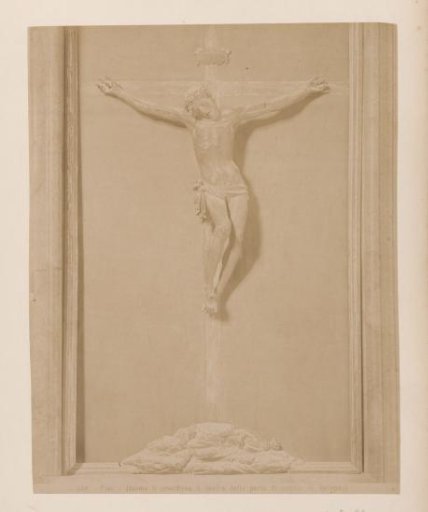 Sculpture of a Crucifixion after Giambologna on a door of the Cathedral of Pisa, Italy