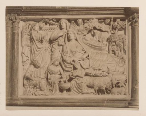 Sculpture The Birth of Christ by Nicola Pisano on the pulpit of the Baptistery in Pisa, Italy