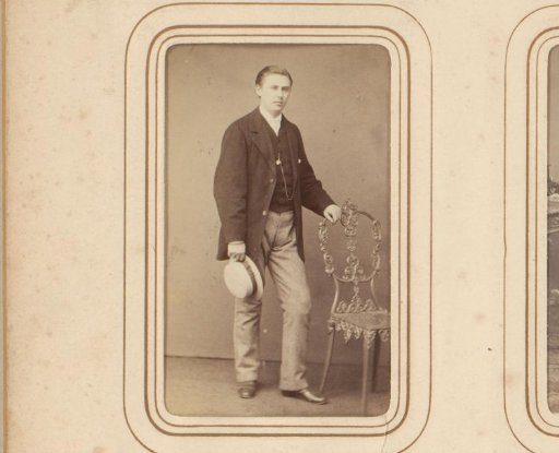 Portrait of a man with a chair
