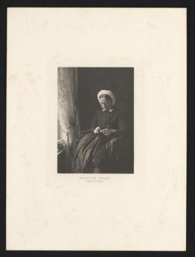 Old woman knitting a sweater