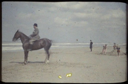 Man on horseback on a beach, France