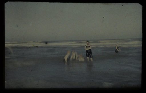 Five figures in the sea