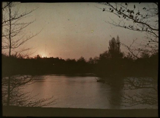 Sunset over a Pond in or near Utrecht, with the Dom Tower in the Background