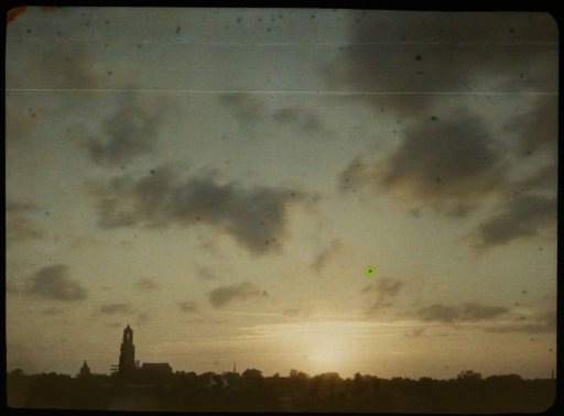 Sunset over Utrecht, with the Dom Tower on the Left and the Buurkerk to the Left of That