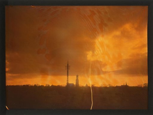 Sunset over Utrecht (with the Dom Tower in the Center and the Buurkerk to the Left of That)