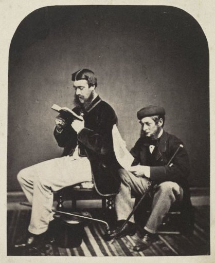 Portrait of two unknown men reading