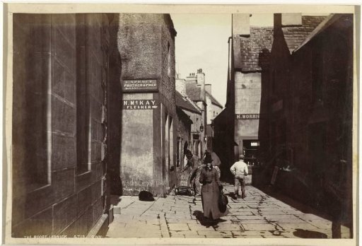 Commercial Street in Lerwick, with the entrance to Charles Spence's photography studio on the left