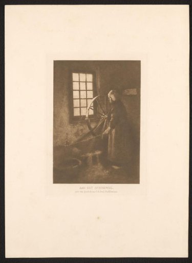 Woman at a spinning wheel