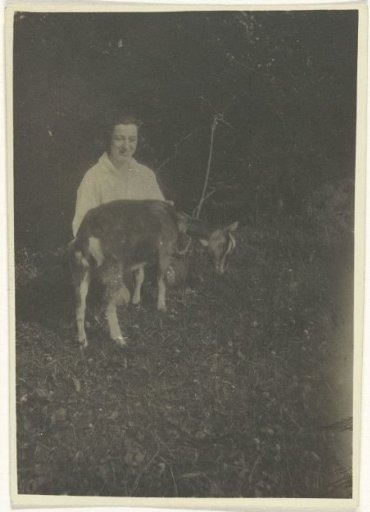 Portrait of Irene With with a goat