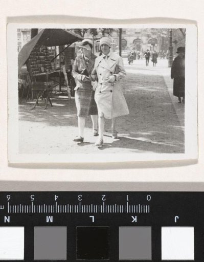 Portrait of Irene With and an unknown woman walking in the street