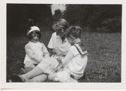 Unknown Woman with Two Children in a Garden