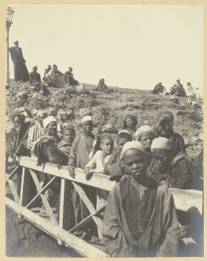 Nubian boys and men on a footbridge, Egypt