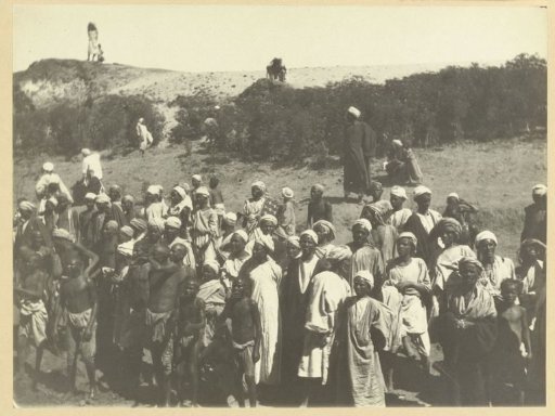 Group of men on the bank of the Nile