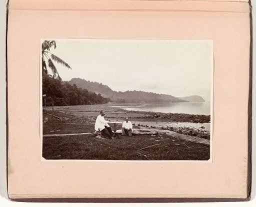 Two men with monocles on the beach of Banda Besar