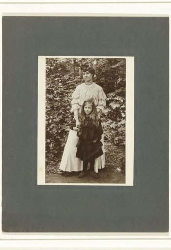 Portrait of a Woman and a Girl in Front of a Bush