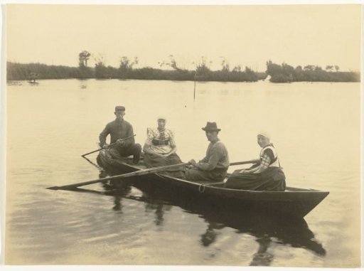 Two Men and Two Women in Bunschoten Costume in a Boat on the Water Het Wiel