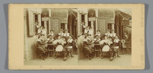Men and women in historical costume at a café during the Oud-Holland exhibition in 1897, Amsterdam