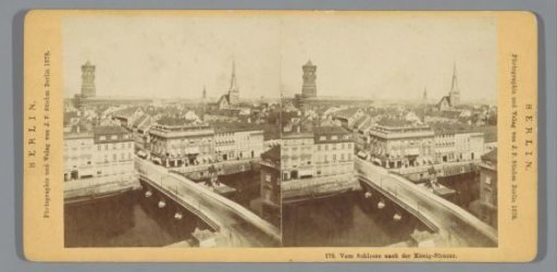 View of Berlin from the Berliner Schloss, with the tower of the Rotes Rathaus on the left, the Nikolaikirche on the right, and the former Lange Brücke bridge in the foreground