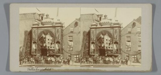 Valkenburgerstraat, decorated with an archway, for the inauguration of Queen Wilhelmina, Amsterdam, Netherlands