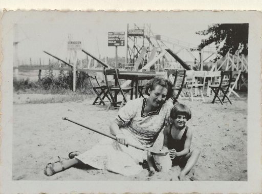 Woman and girl on the beach at Valkeveen near the playground