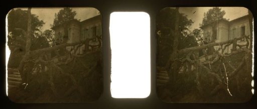 Man and Woman on the Stairs in Front of a Country House