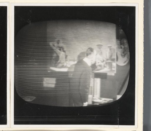 Photograph of a Television Screen, Carel Willink Working on the Painting 'Equilibrium of Forces' (1963), Likely During the Broadcast of the Film 'Carel Willink' by Hélène van Zijl, Lies Westenburg, and Hans Redeker (1963)