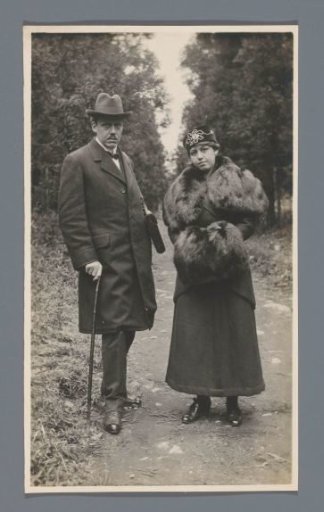 Portrait of a man (with a camera bag?) and a woman (of the traveling party), Nikko, Japan