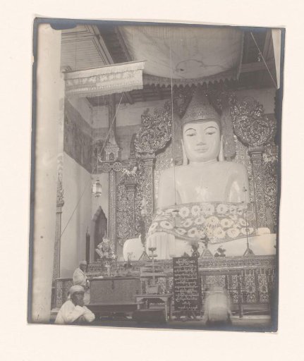 Interior of a Buddhist shrine with an image of Buddha, Myanmar
