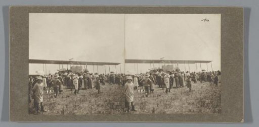Italian Caproni 3 aircraft in a meadow, surrounded by spectators, Is-sur-Tille, France